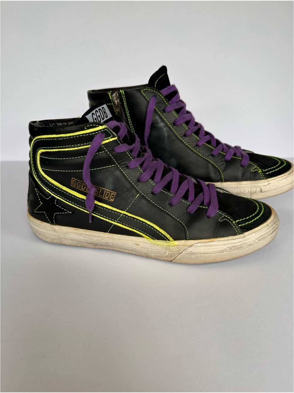Golden Goose Black High-Top Sneakers with Yellow Piping and Purple Laces